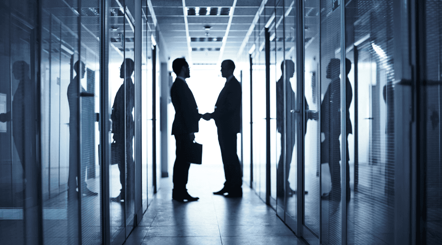 Canva_Industries_900x500_Industrials_PE_Handshake.png